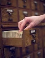 hand in old card catalog