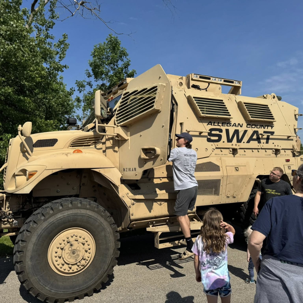 Allegan County SWAT truck with people looking at it
